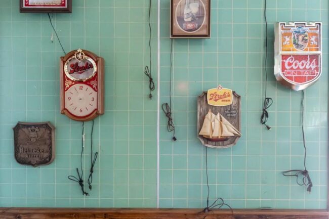 A collection of old beer signs is part of the decor.